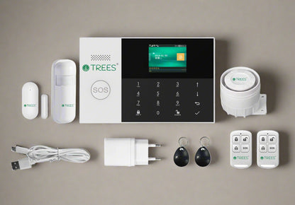 Set of TREES home security system components on a beige background